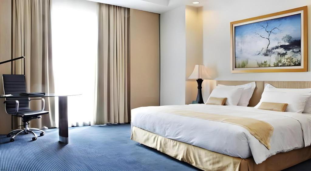Sintesa Peninsula Hotel Manado Extérieur photo